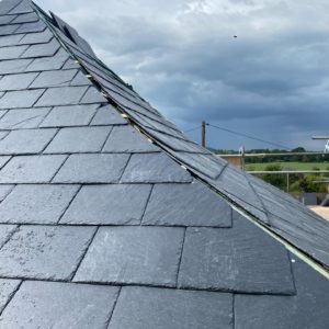 Today’s lesson was how to lay a curved slate roof.